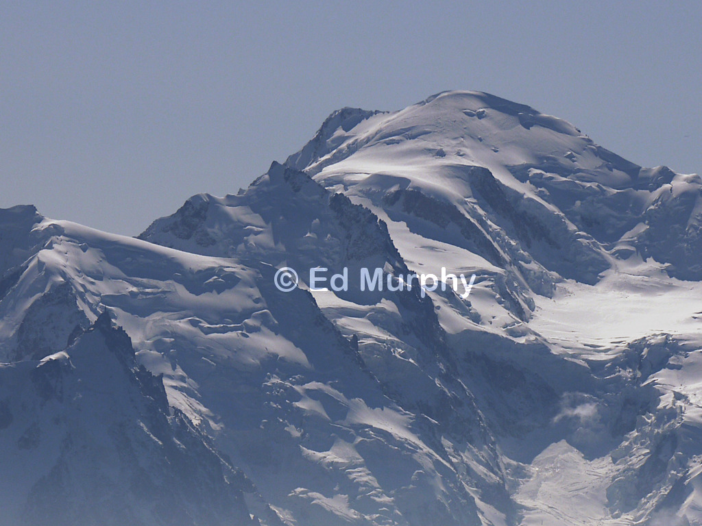 The Aiguille du Midi silhouetted against the snows of Mt Blanc