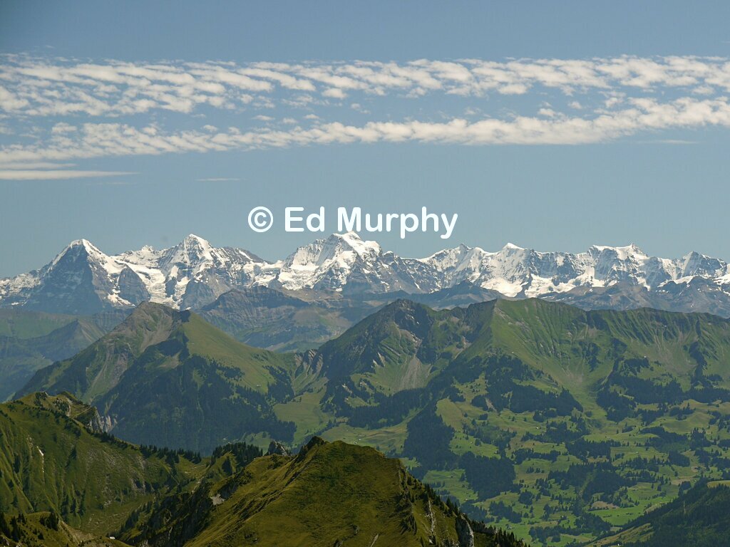 Eiger, M&ouml;nch and Jungfrau beyond the Niesen chain