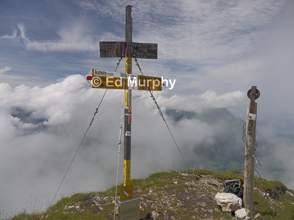 The abandoned snack lift beside the signpost on the Gehrihorn's summit