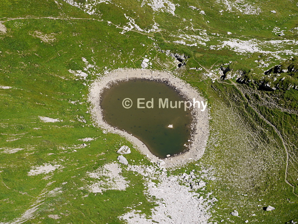 The tiny Lac de Segray below the Tour de Mayen