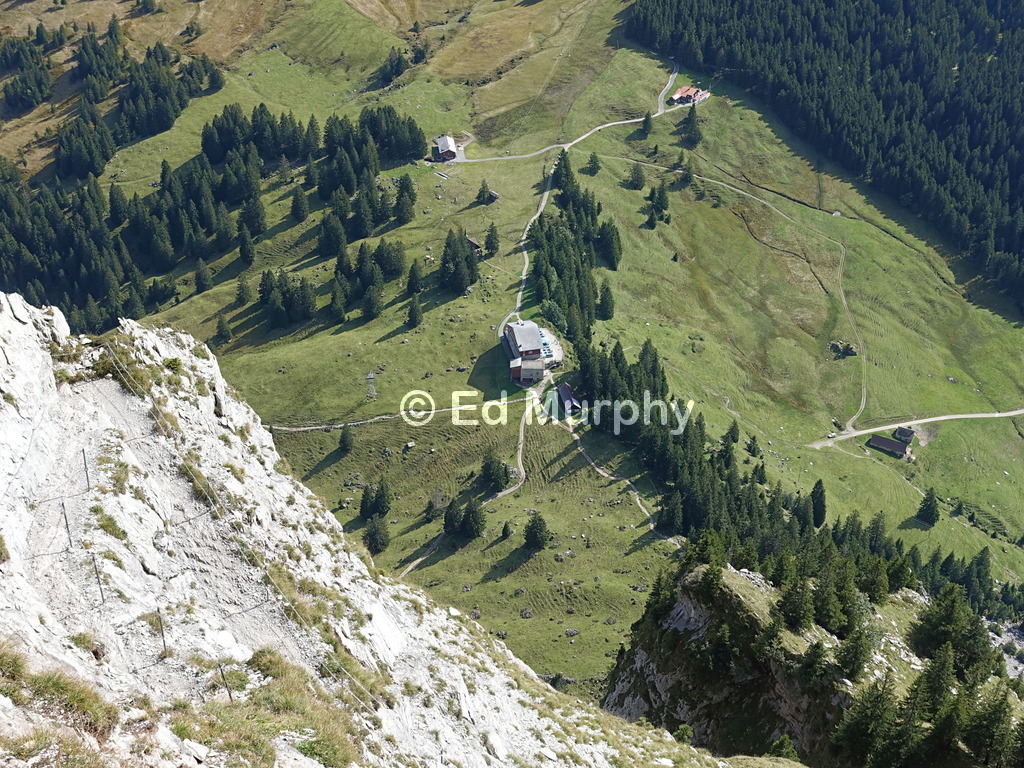 The Holzegg restaurant and cable car station from the Gross Mythen path