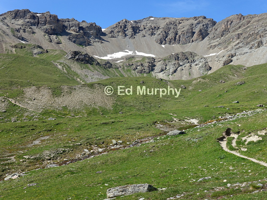 The cliffs of Piz Minschun seen from below Lej da Minschun