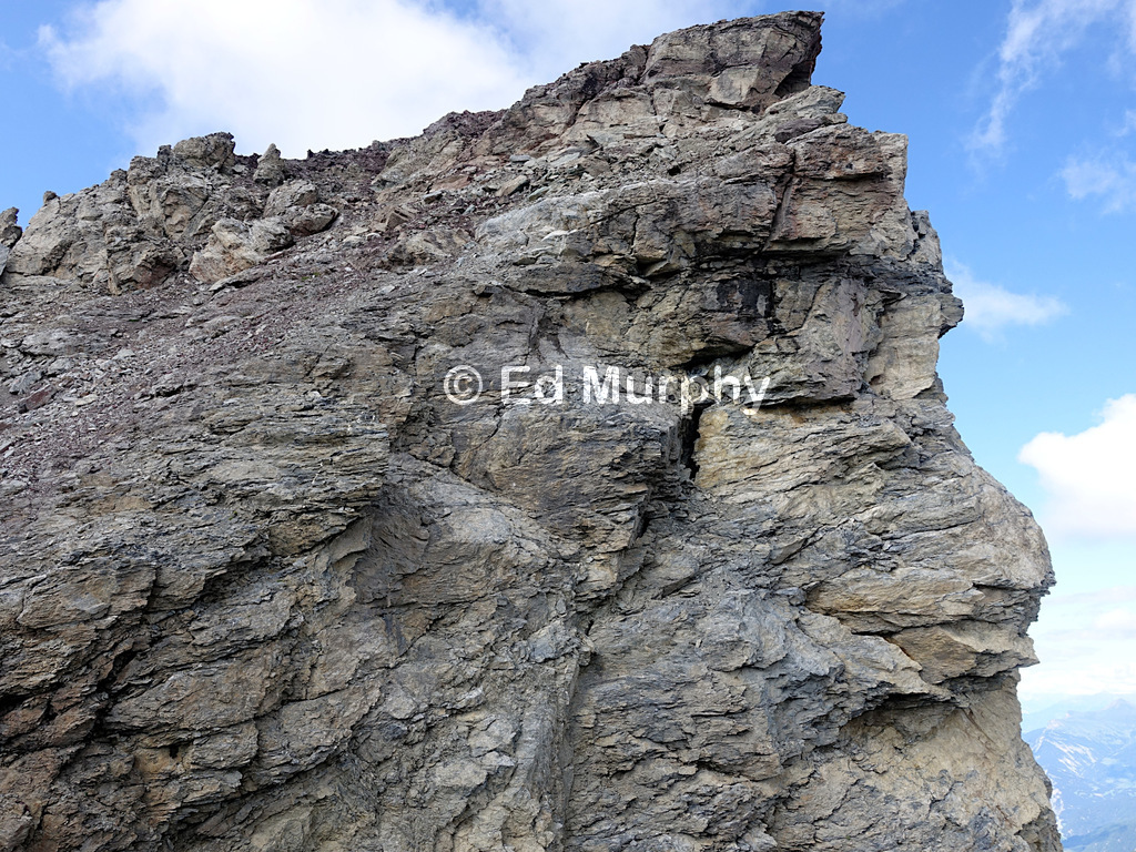 Crack forming as part of the summit of Piz Lischana peels away