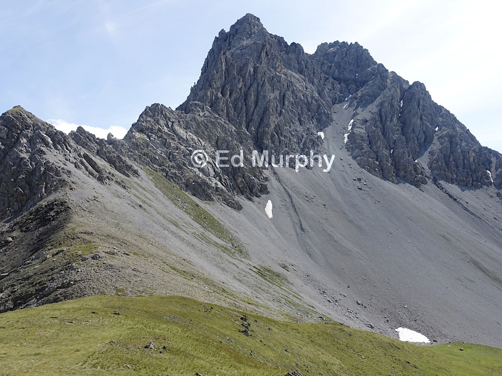 View to Piz Nair from Munt da la Bes-cha's grassy summit